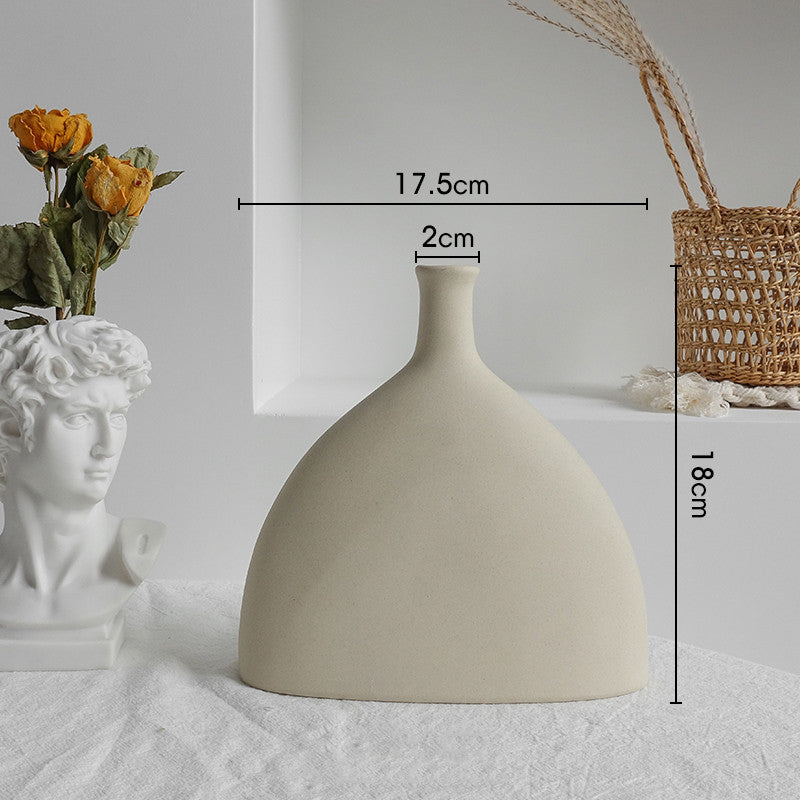 Matte minimalist ceramic vase with dried flowers