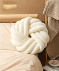 Nordic knotted ball throw pillow in white