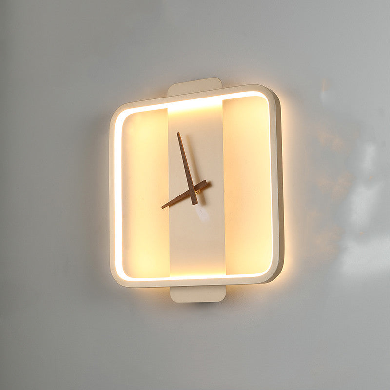 Nordic clock wall lamp glowing in golden square style