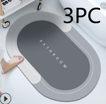 Quick-dry absorbent bath mat on bathroom floor
