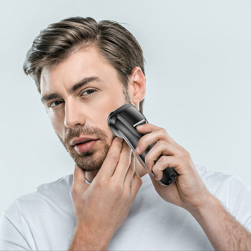 Cordless electric shaver and body groomer for men