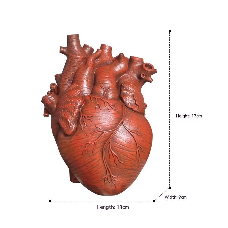 Sculptural heart flower pot