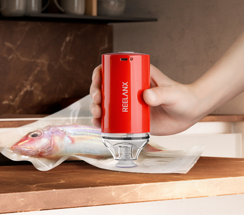 Vacuum sealer in use on bag