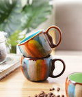 Handmade ceramic coffee mug with lid and spoon