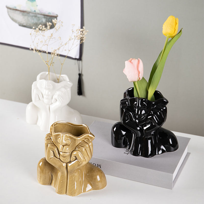 Ceramic art vase styled on shelf