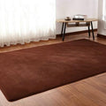 Fluffy white plush area rug in bedroom