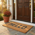 EllCo custom welcome doormat at a front door