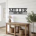 E&C custom metal family name sign
